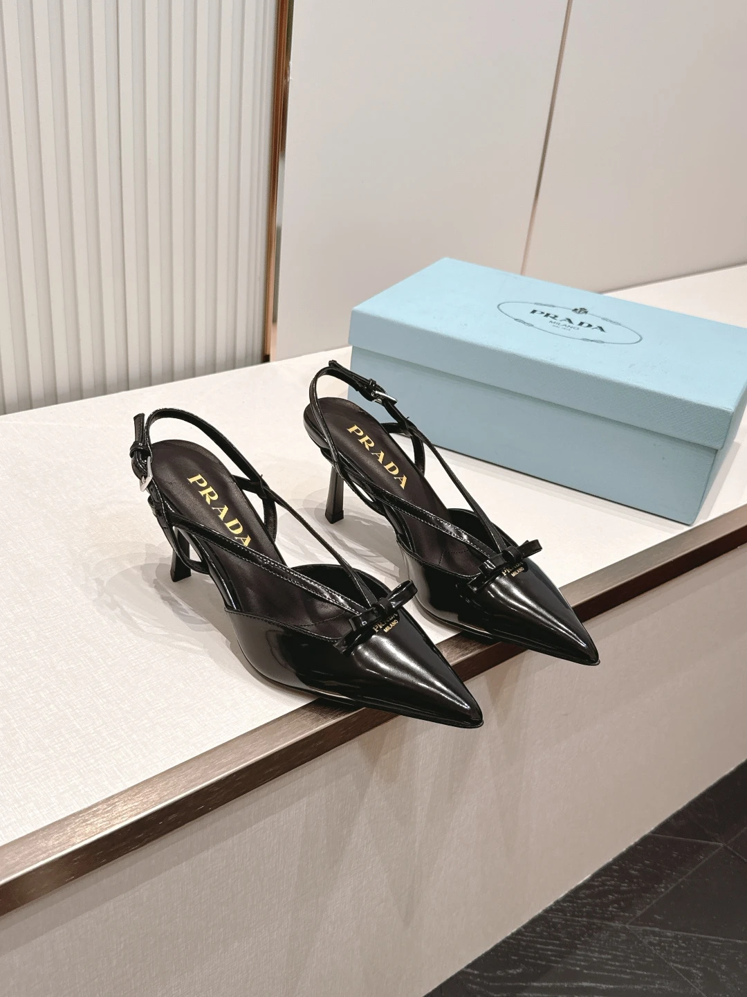 Prada Slippers — 66b42573
