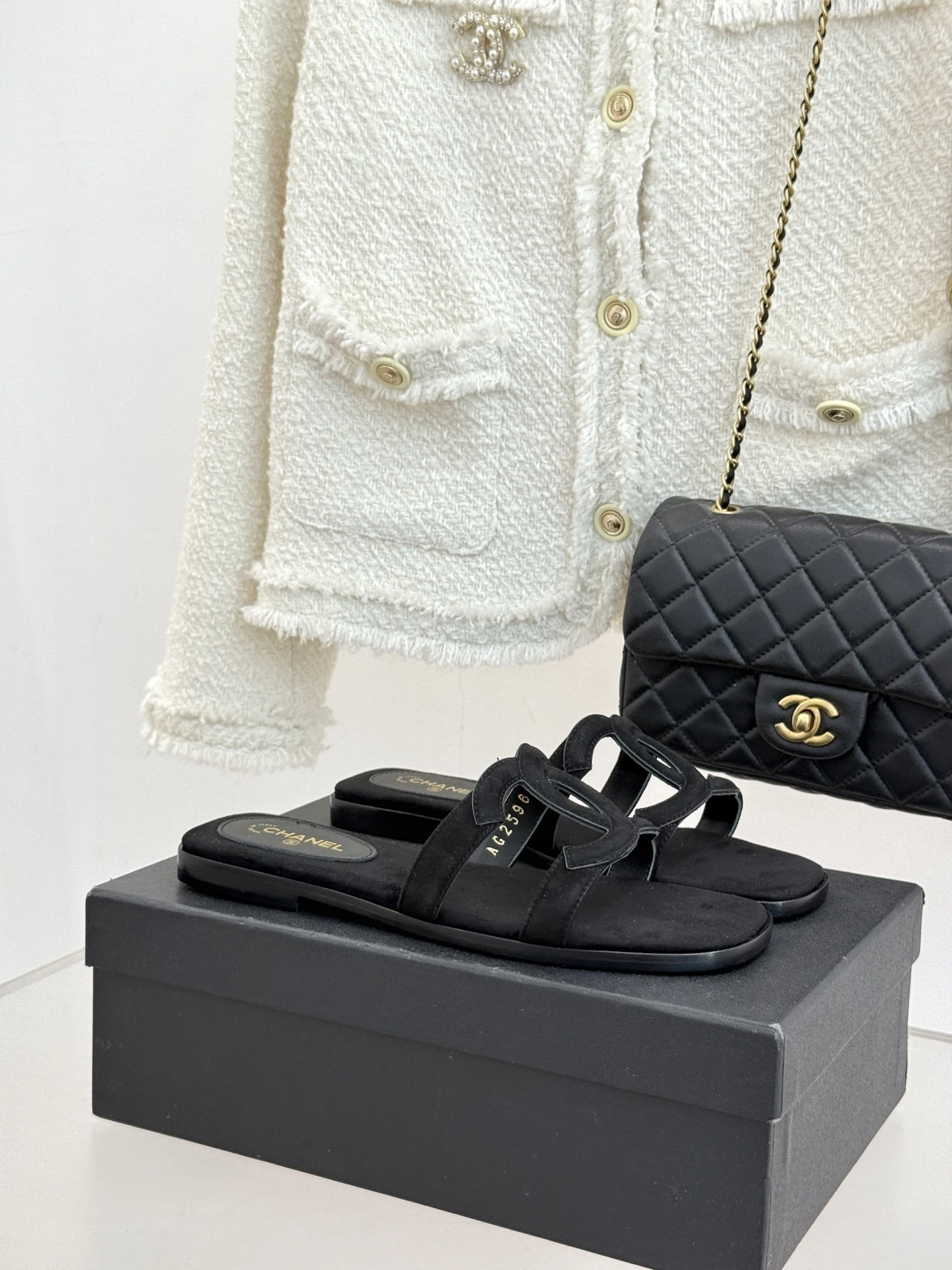 Chanel Slippers — f0f77a8b