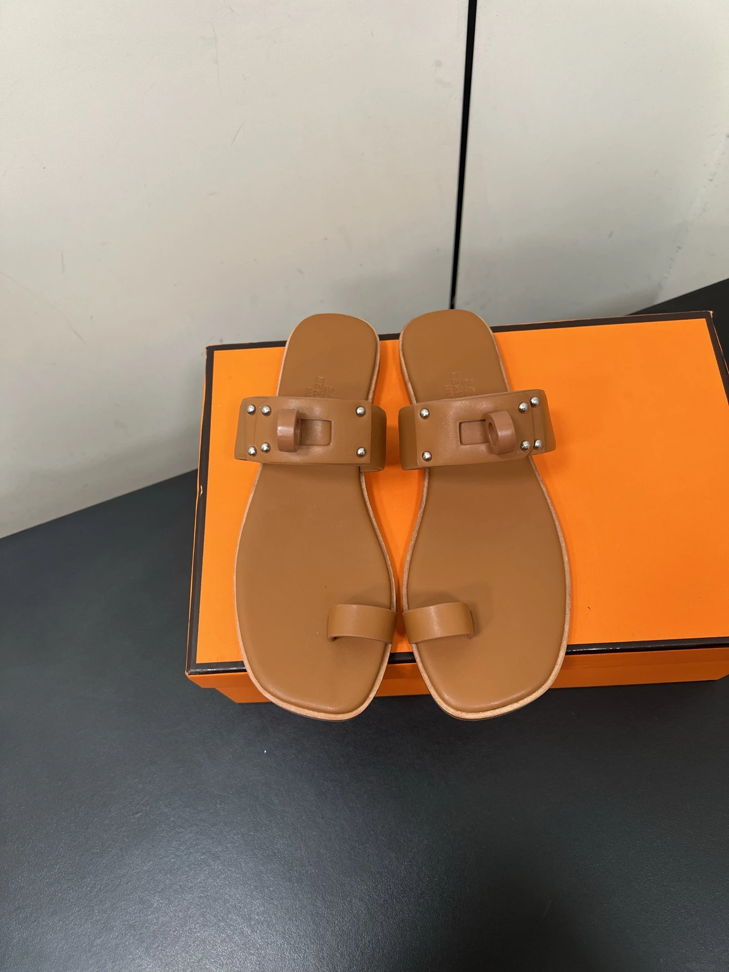 Hermès Slippers — 69291575