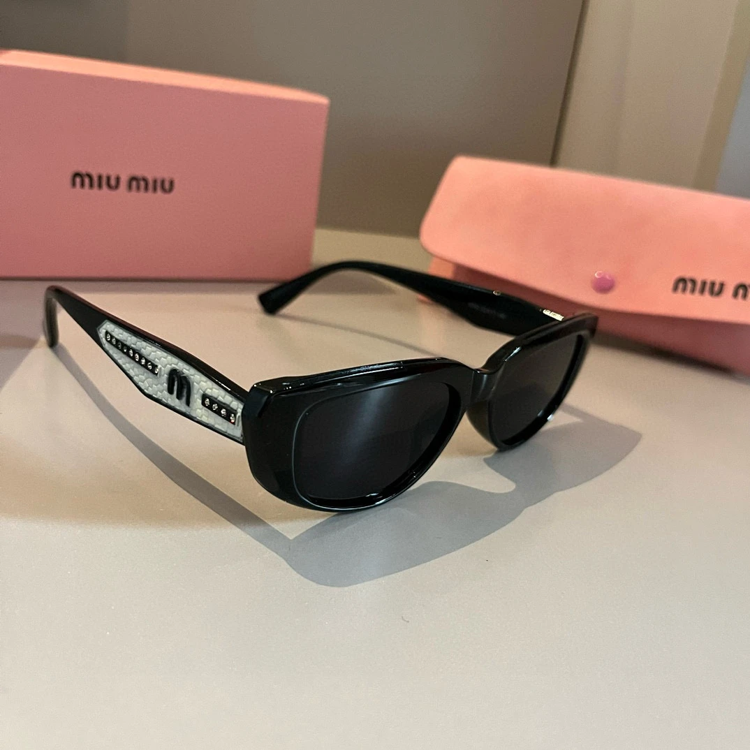 Miu Miu Eyewear — 8416df37
