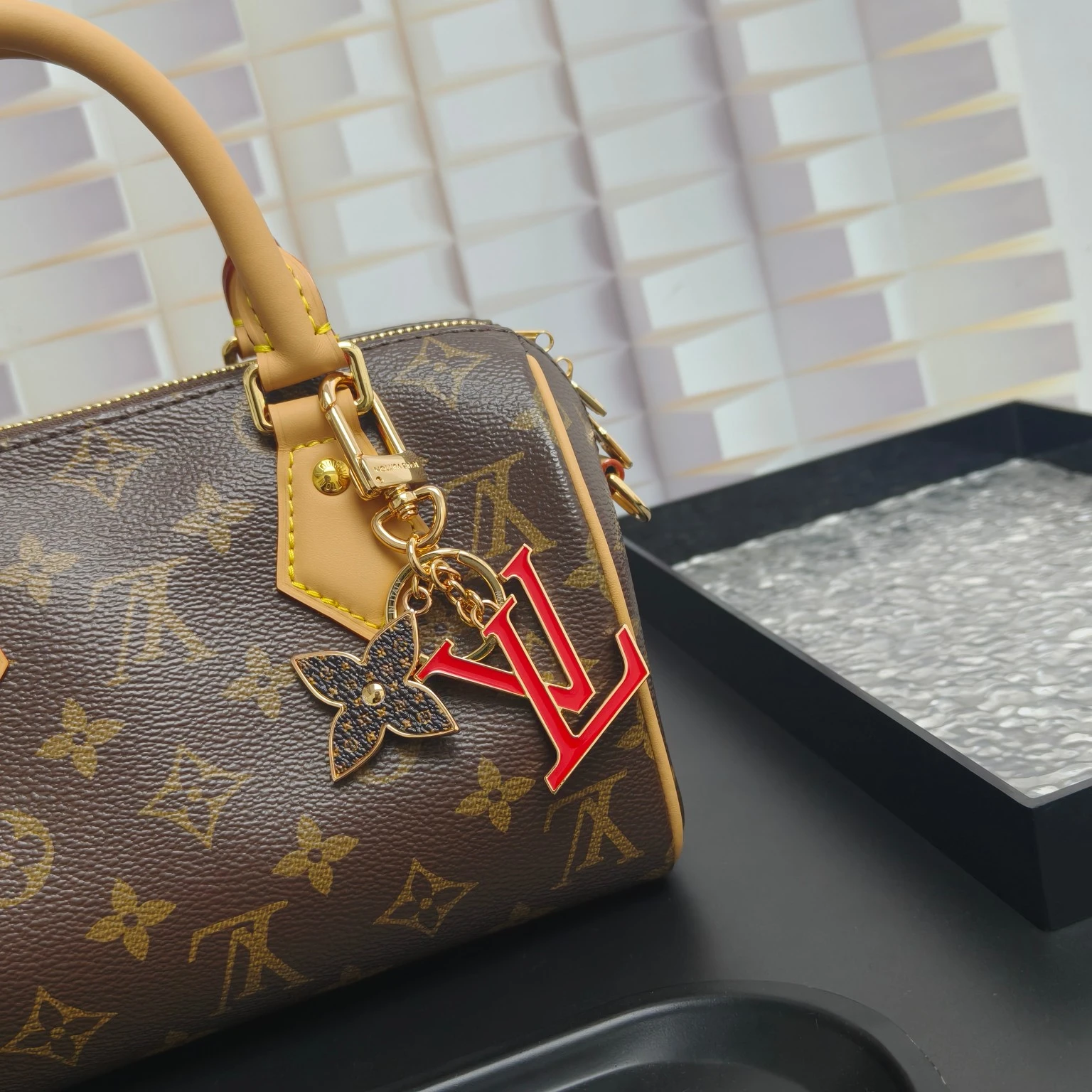 Louis Vuitton Keyrings & Bag Charms — 587b2313
