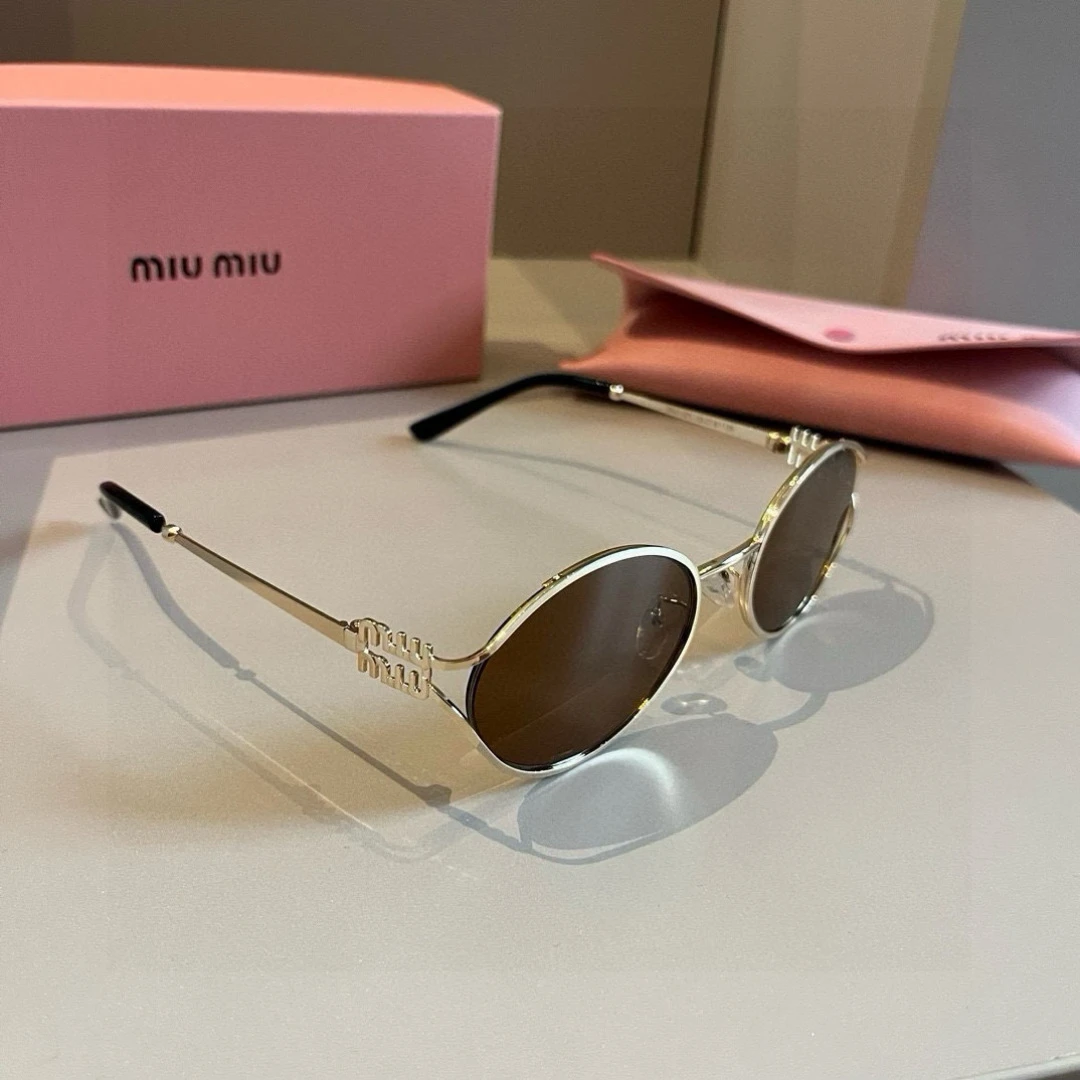 Miu Miu Eyewear — 32722b12